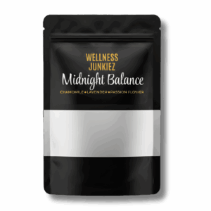 A black stand-up pouch of Wellness Junkiez Midnight Balance natural support supplement for restful sleep and calm.