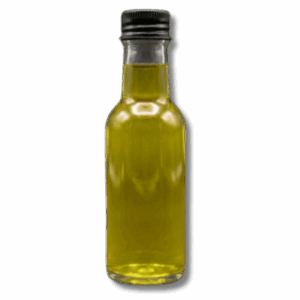 Clear miniature glass bottle filled with a vibrant energy wellness shot liquid on a dark background